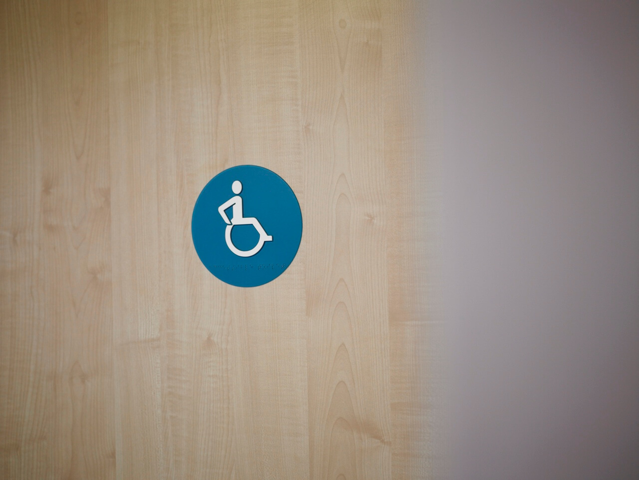 Pictograms at Brandon Primary School indicate accessible toilets